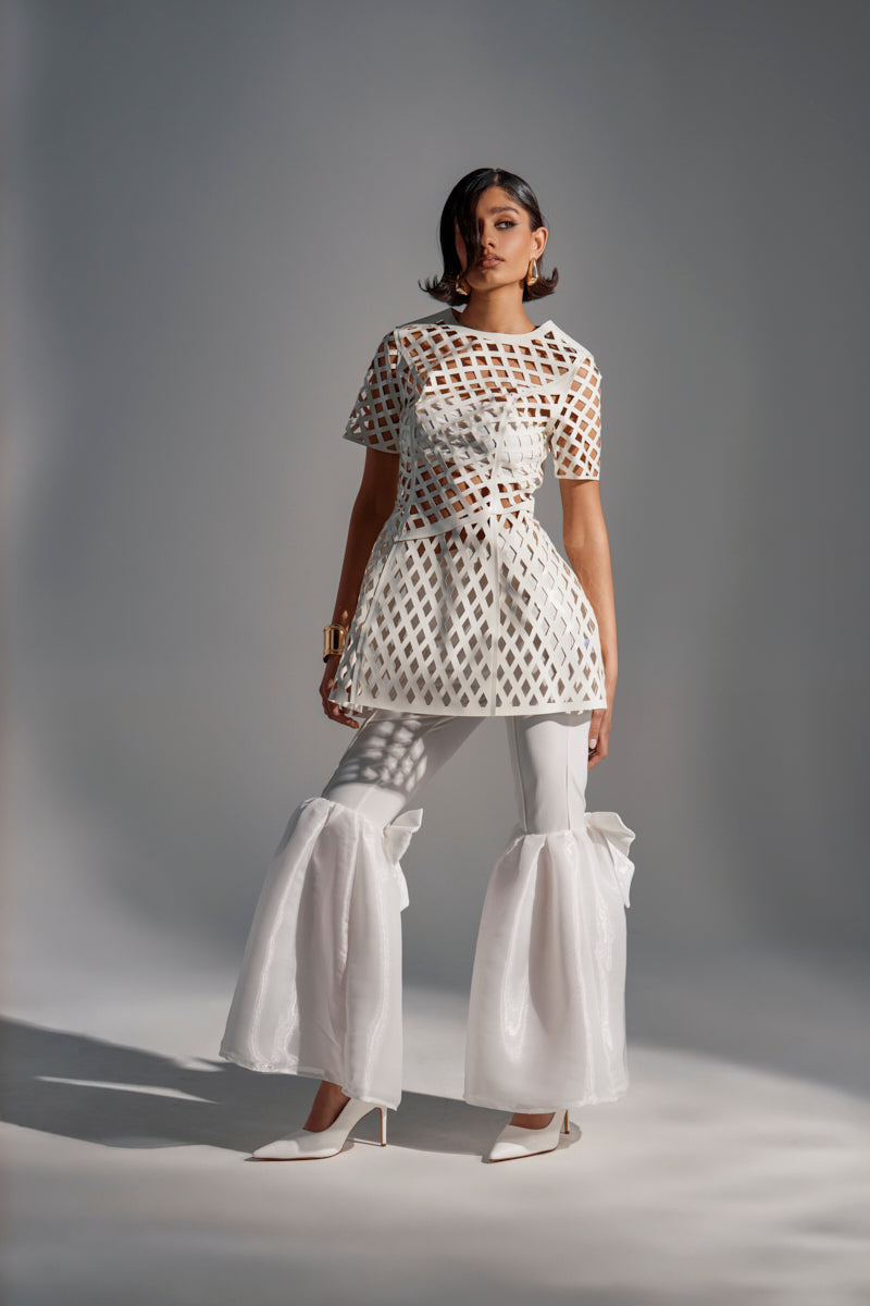 SHE'S DIFFERENT CUT OUT FAUX LEATHER MINI DRESS IN WHITE